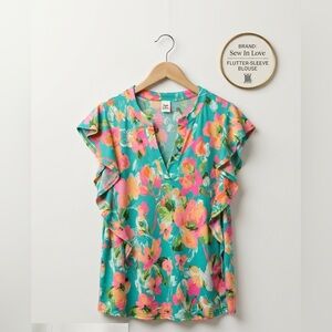 Sew in Love Boutique vibrant tropical-chic ruffle accent v neck blouse size Med